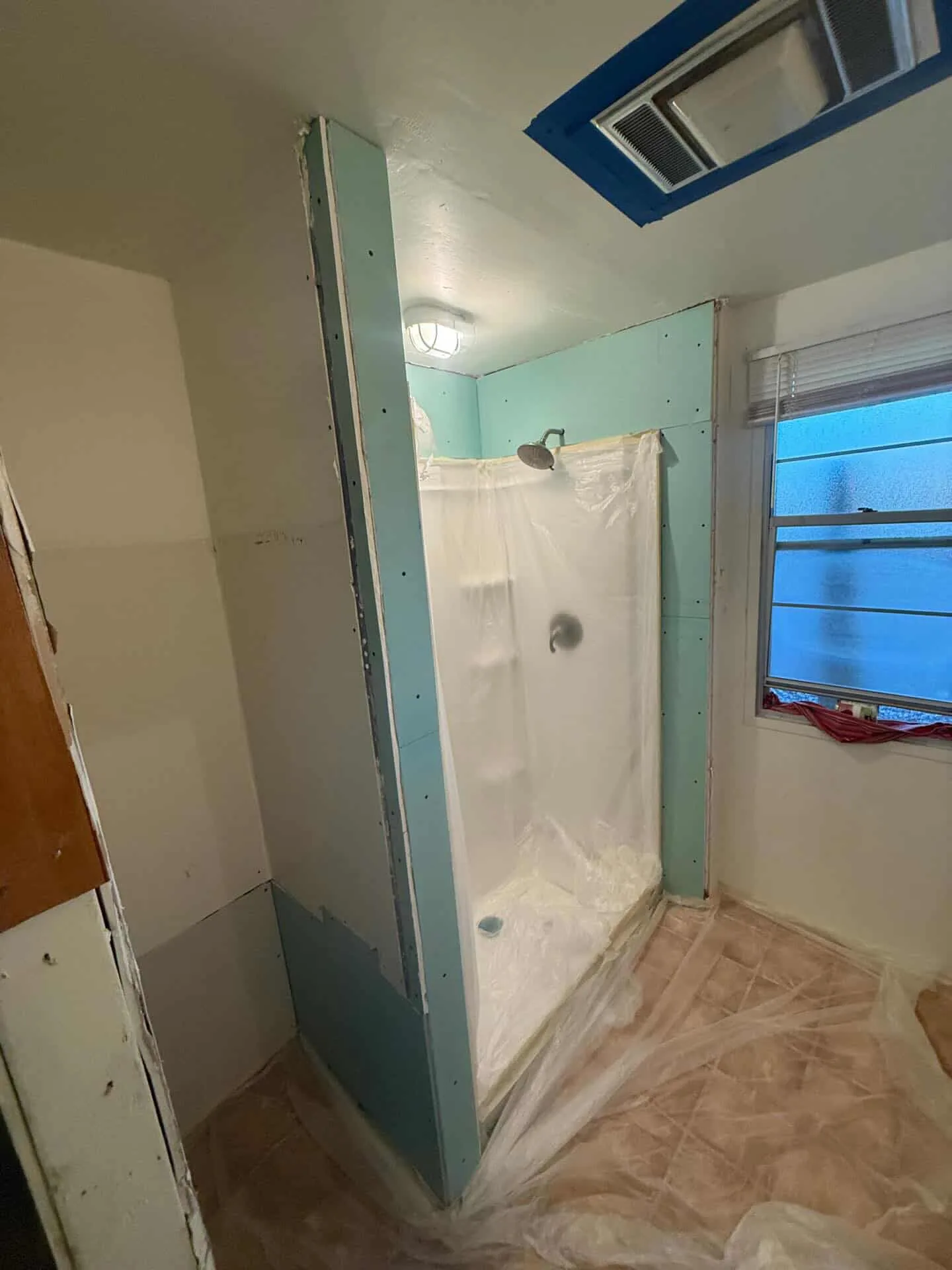 Bathroom remodel before drywall repair in Phoenix, AZ