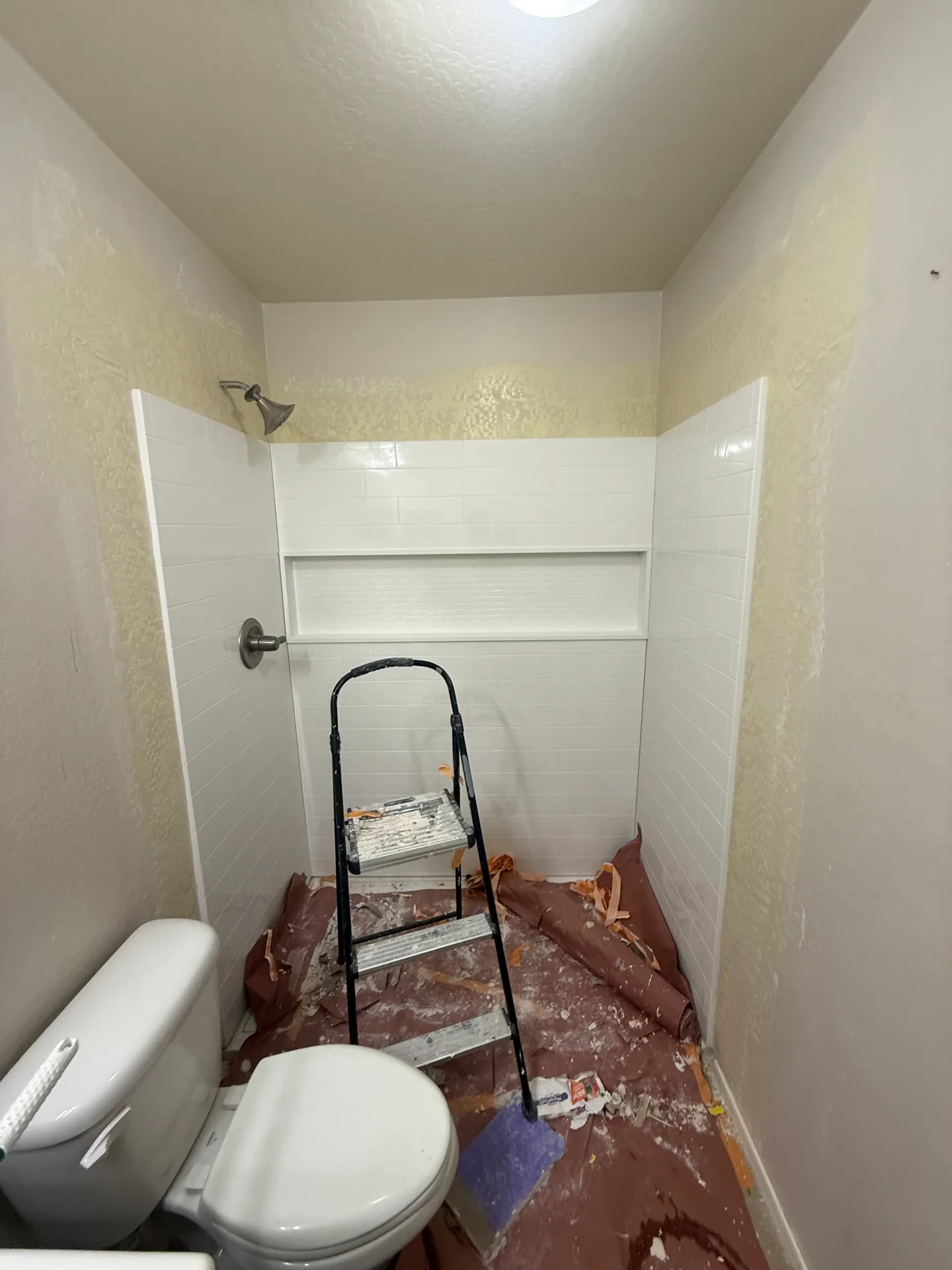 Drywall taping during a Phoenix, AZ bathroom remodel